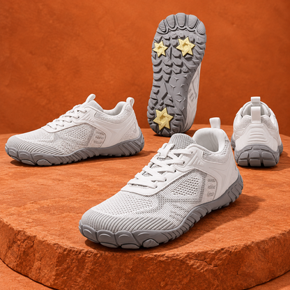 SteppX Flyknit Outdoor white four-angle product display on orange sandstone
