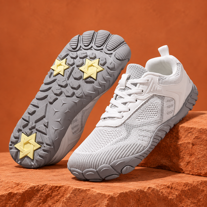SteppX Flyknit Outdoor white pair on orange sandstone