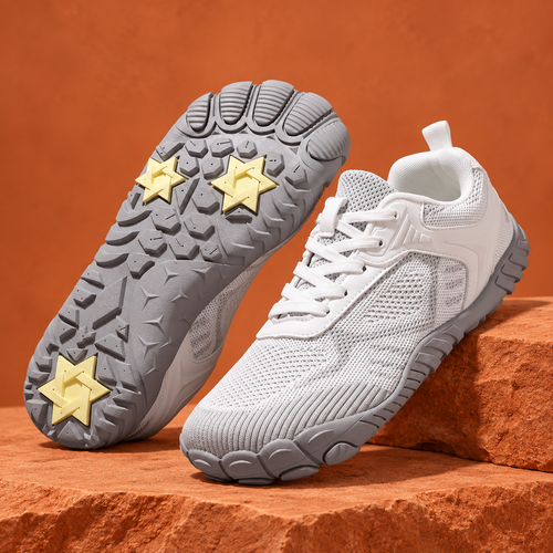 SteppX Flyknit Outdoor white pair on orange sandstone
